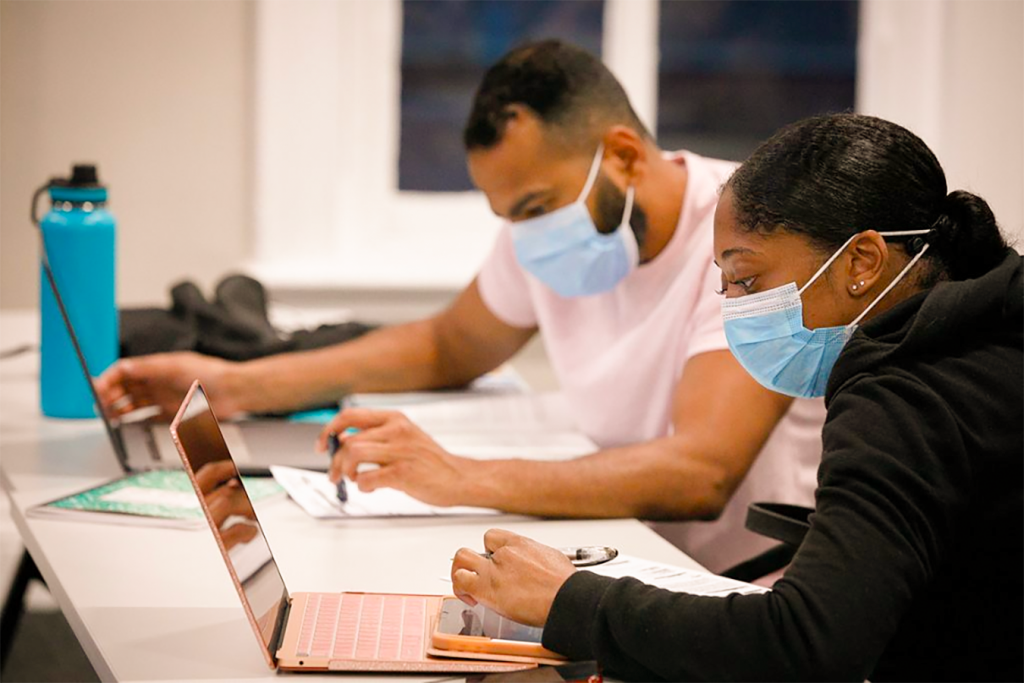 students studying with computers