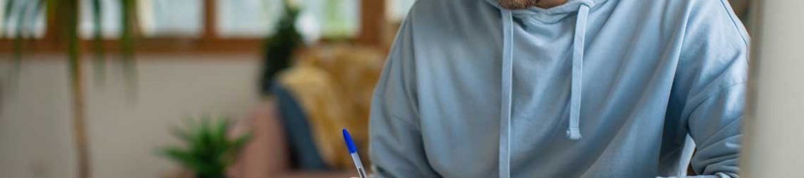 Nursing student studying at table