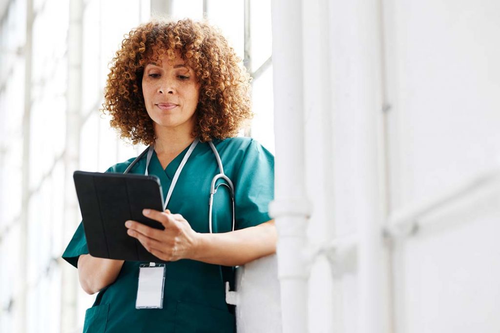 nurse on her ipad