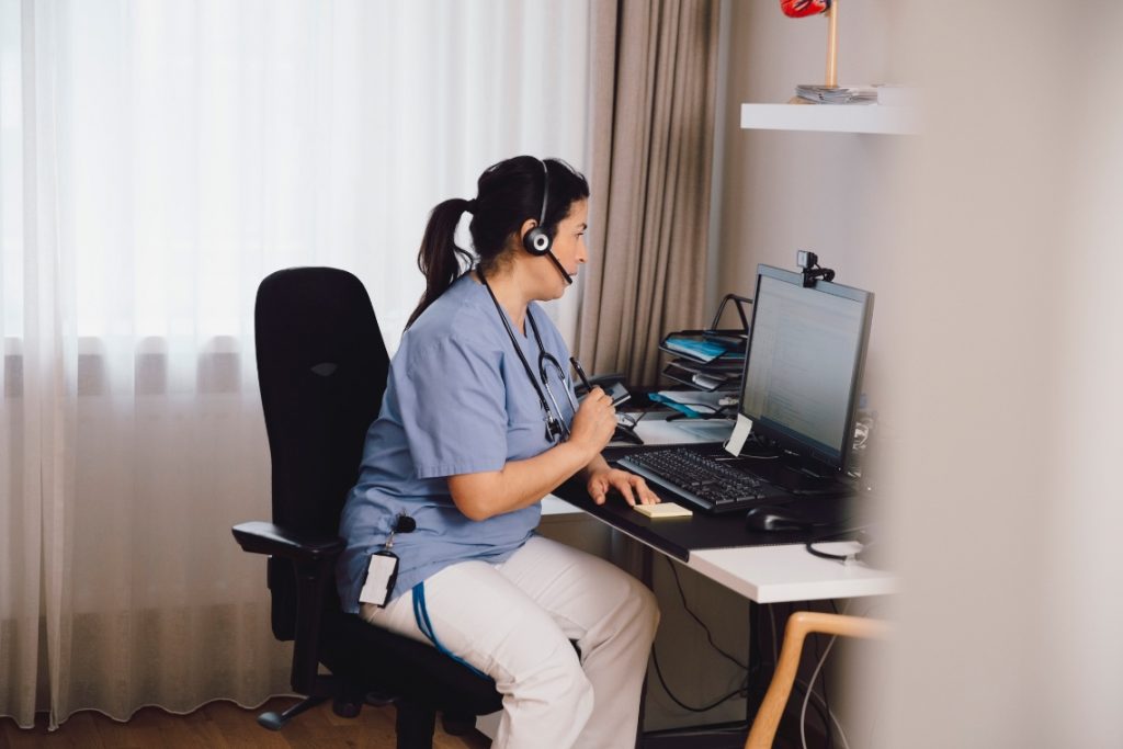 nurse on computer