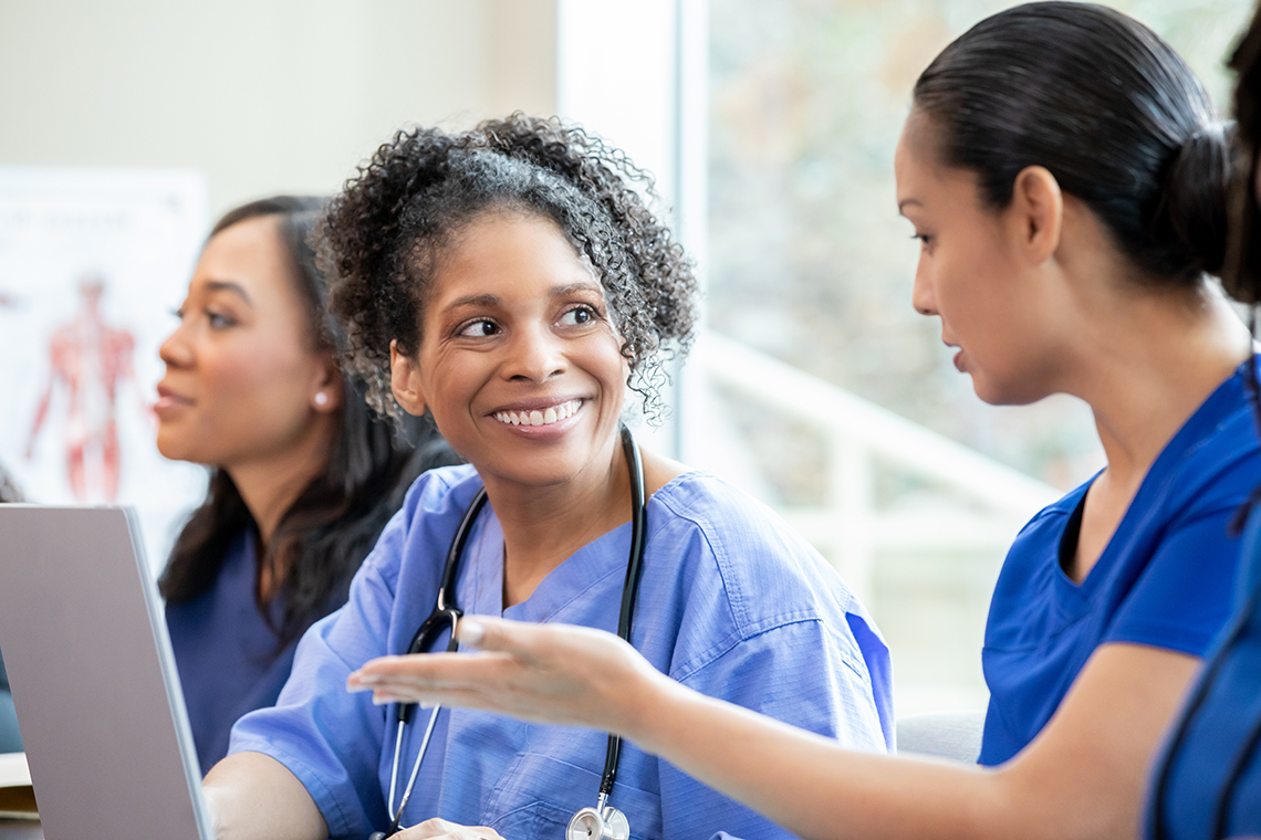 Nursing students in classroom talking