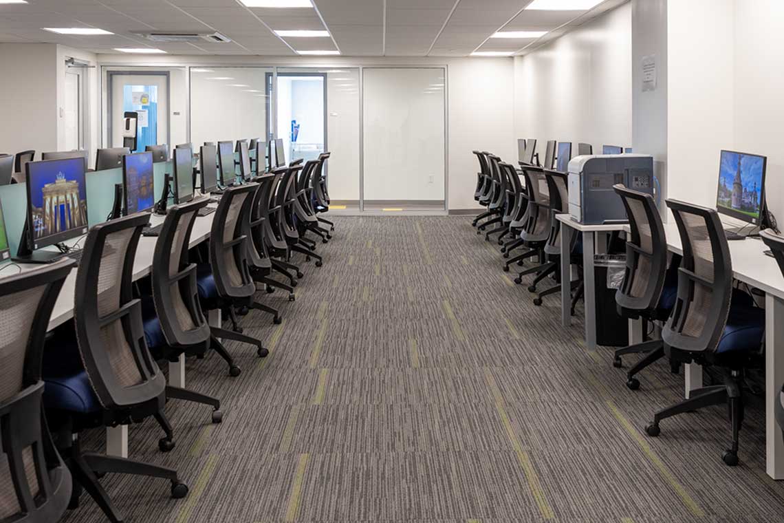 room with chairs and computers