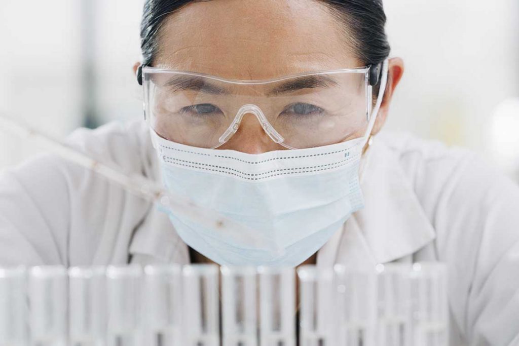 nurse with test tubes