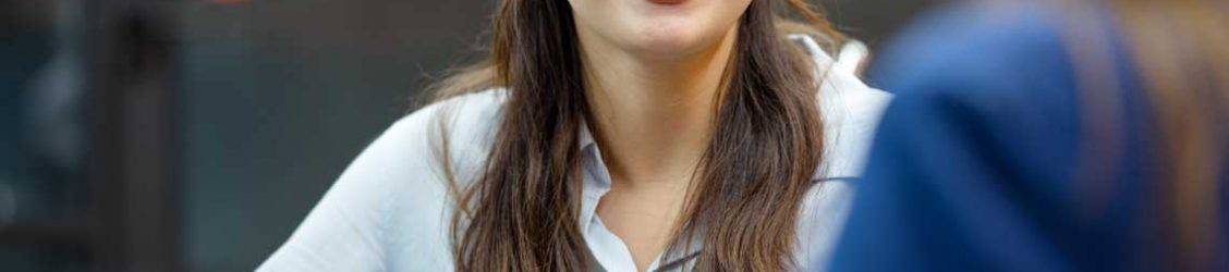 woman sitting in interview