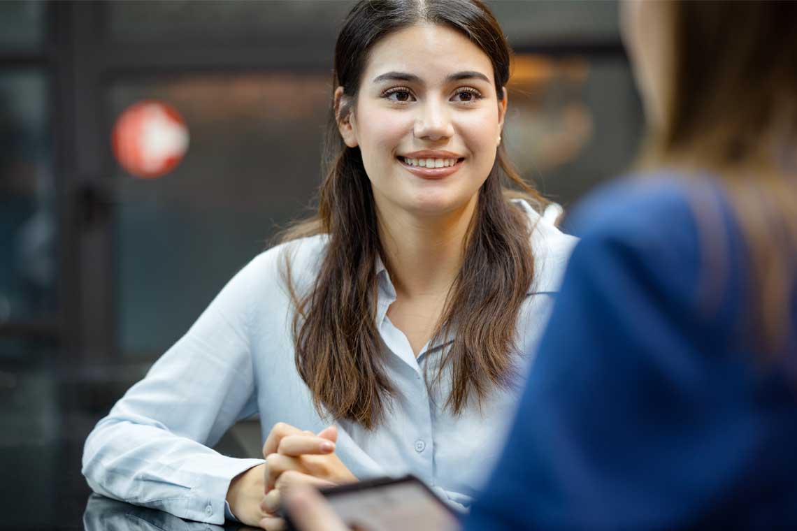 woman sitting in interview