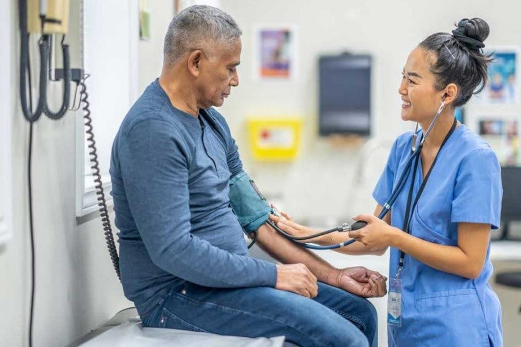 Nurse working with patient